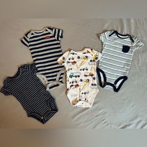 4 onesies for $10 total. Baby boy’s 0-3 months.